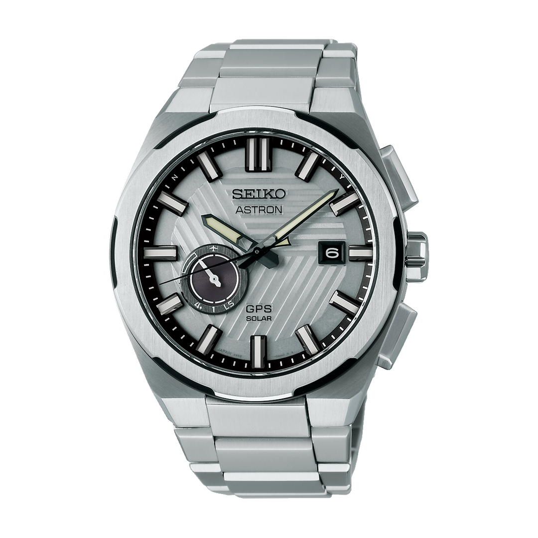 Seiko Astron watch with silver metal band on a white background