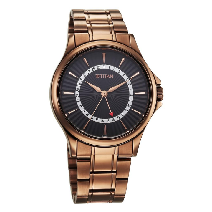 Titan Karishma men’s quartz watch featuring a black analog dial with date display and a durable stainless steel strap.